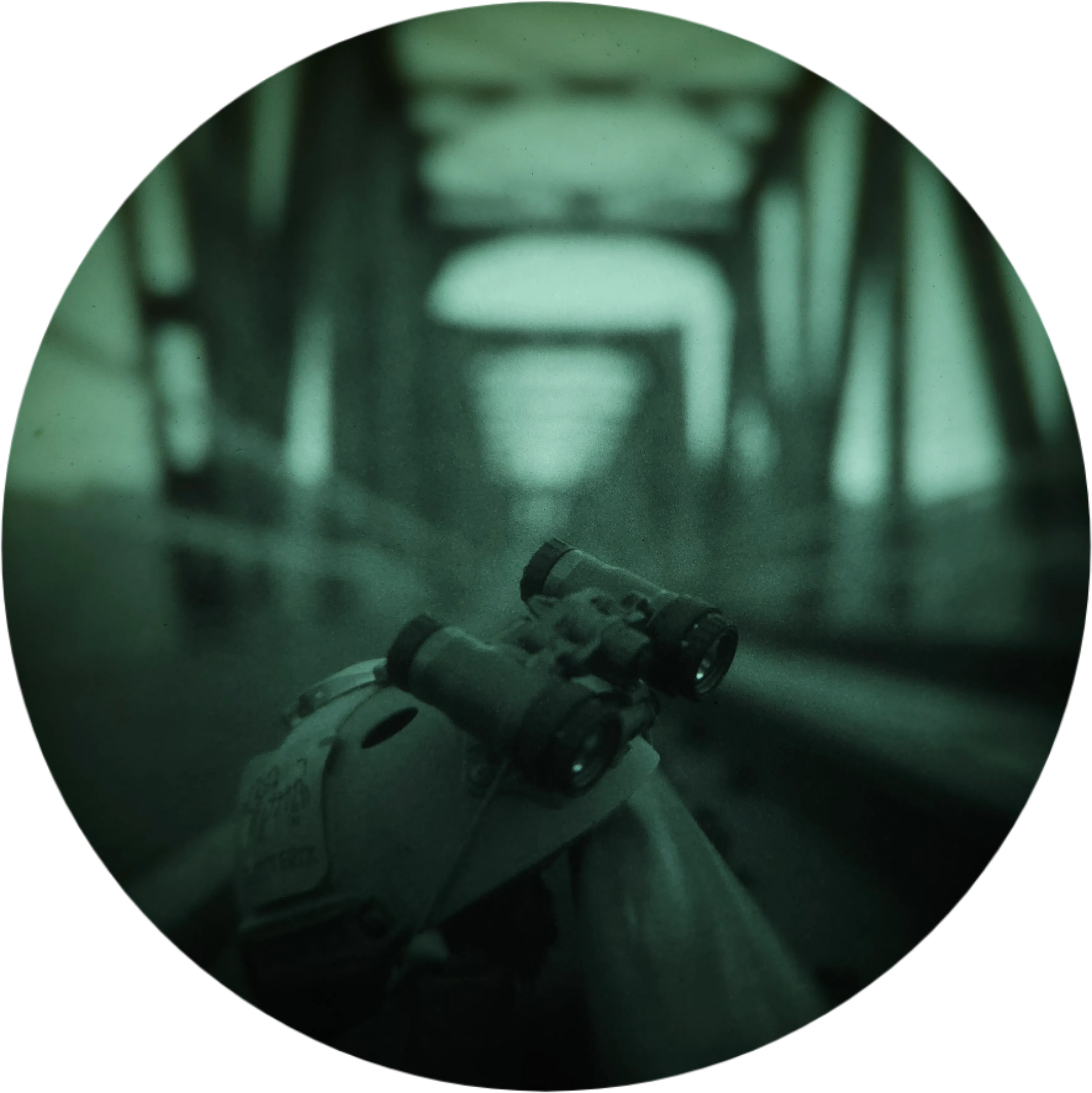 Panoramic night-vision binoculars mounted on a helmet, view through the device on a bridge