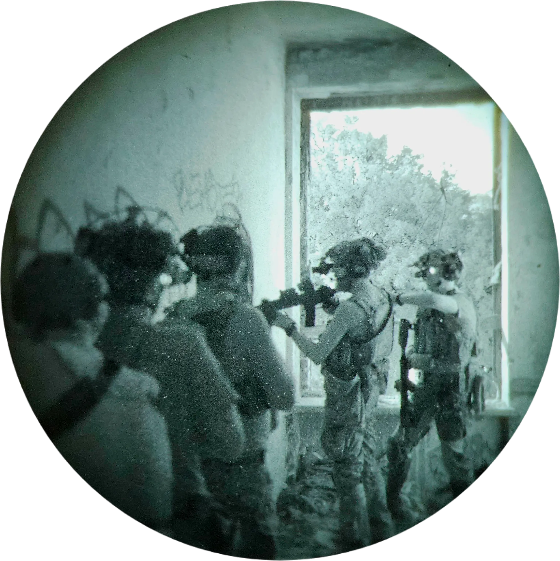 Group in tactical formation using rented night vision during CQB training