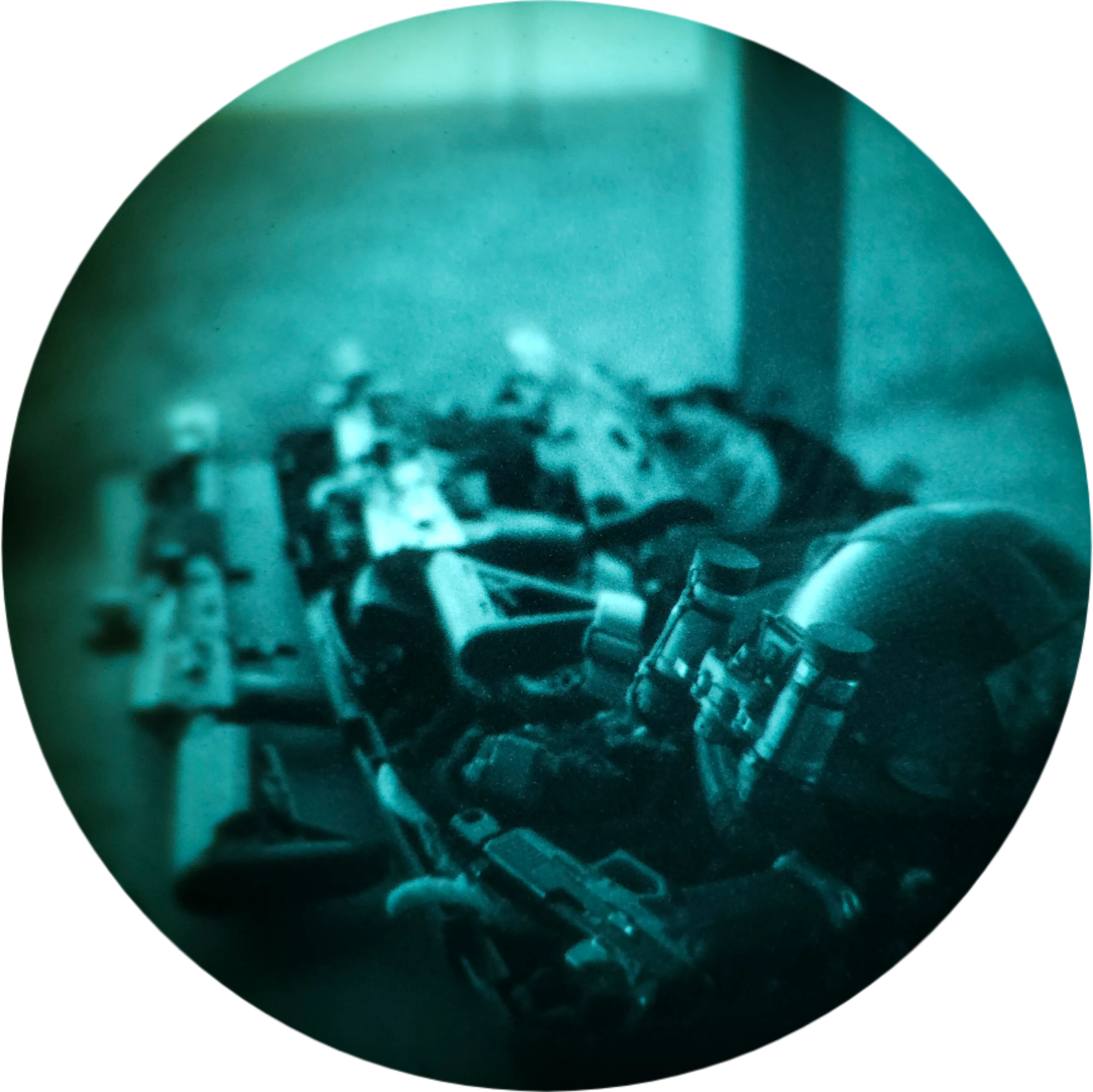 A set of rented equipment — replica weapon, night vision and helmet laid out before use