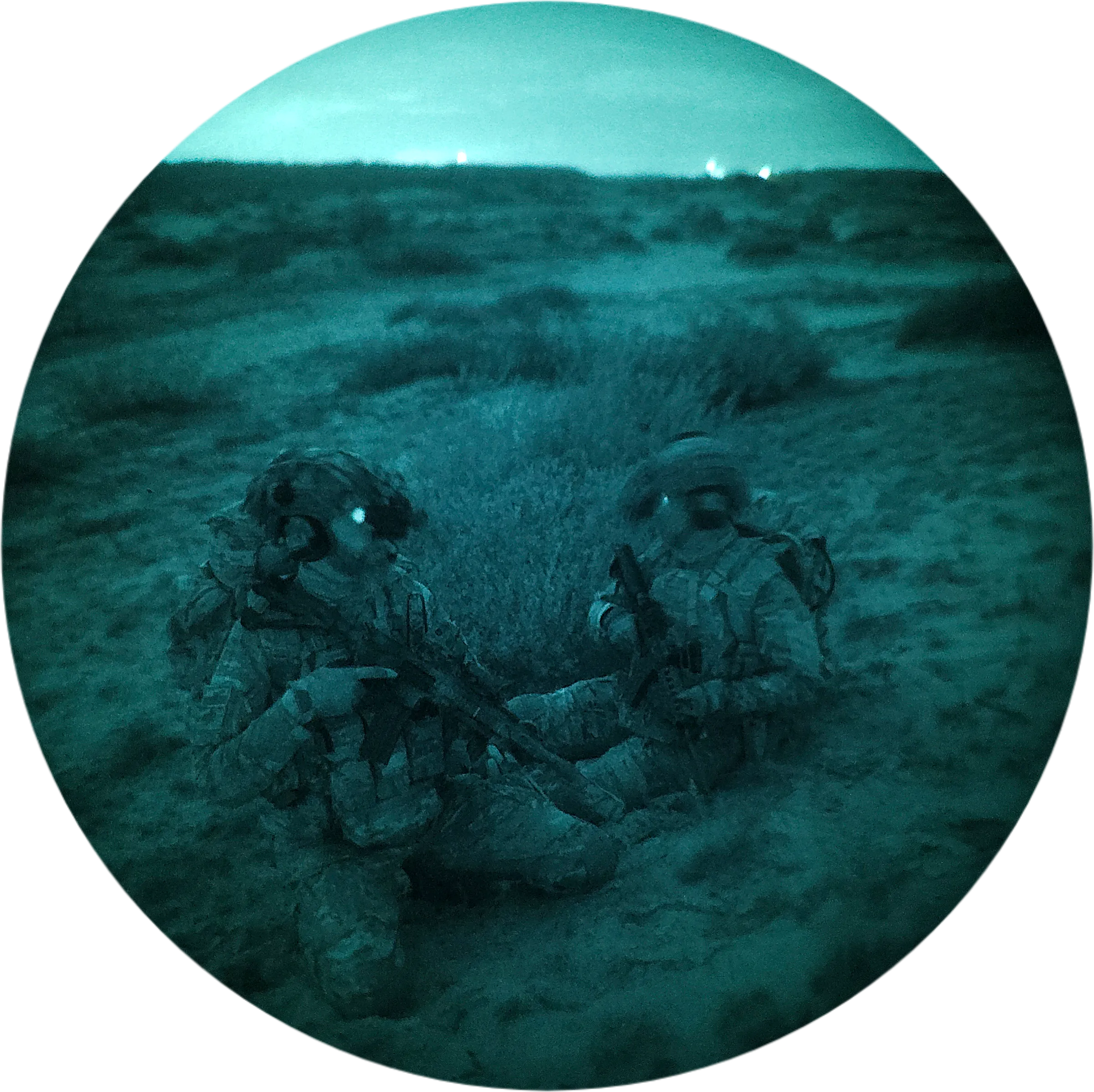 Two-person team with rented night vision, prone position aiming rifles at dusk
