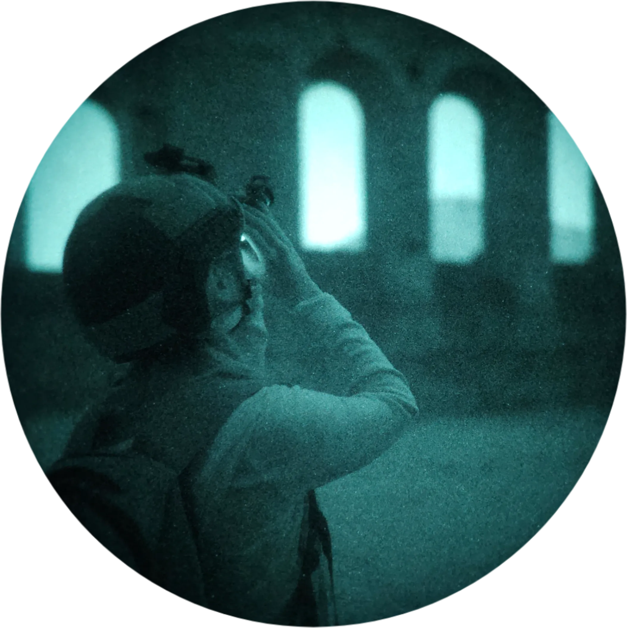 Trip participant looking out through the window of an abandoned building at the quarry