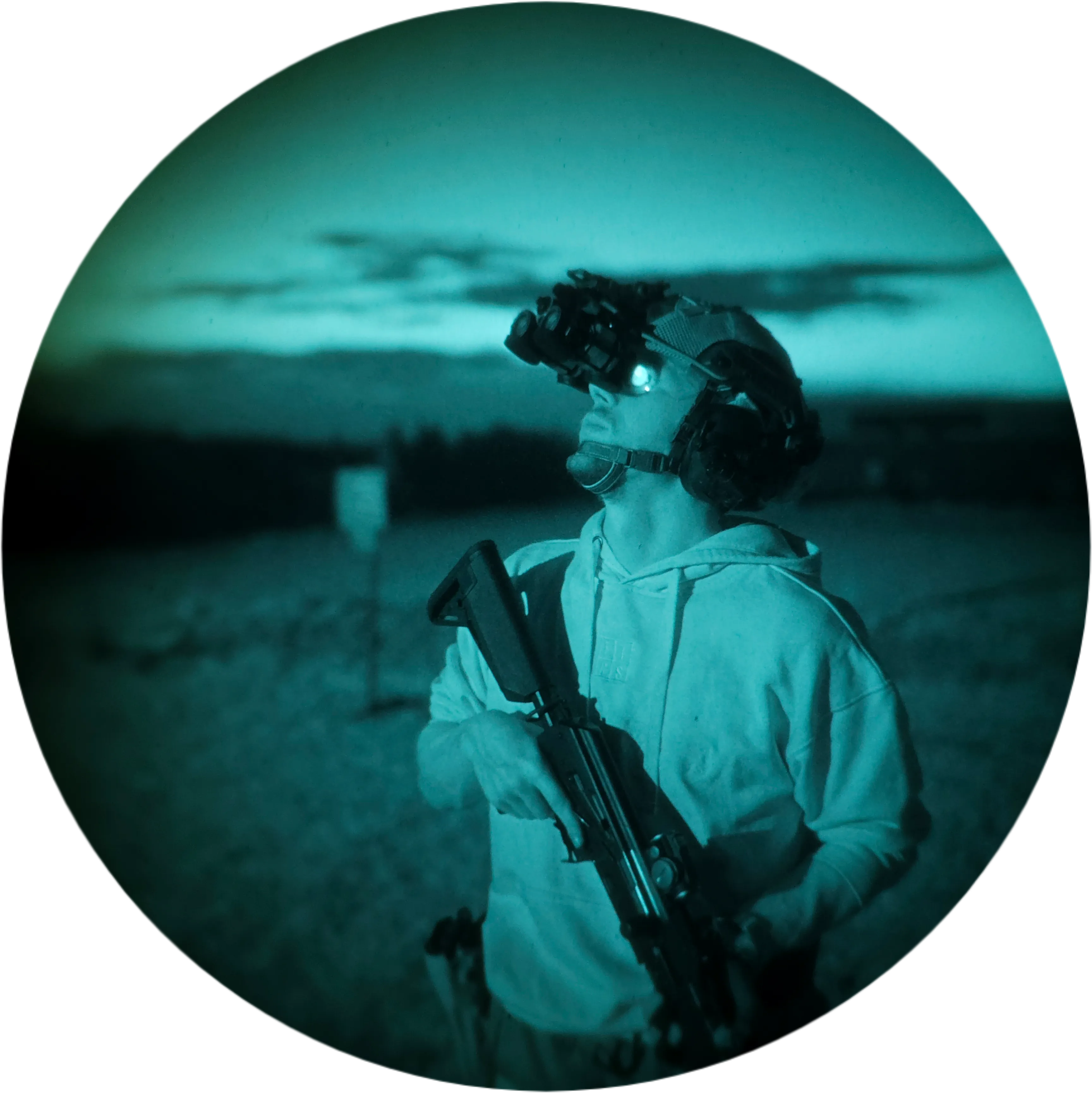 Rented replica weapon with night vision mounted on a helmet during tactical training
